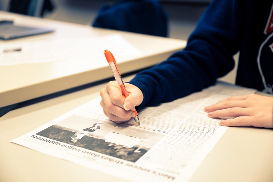 Brown and White student editing